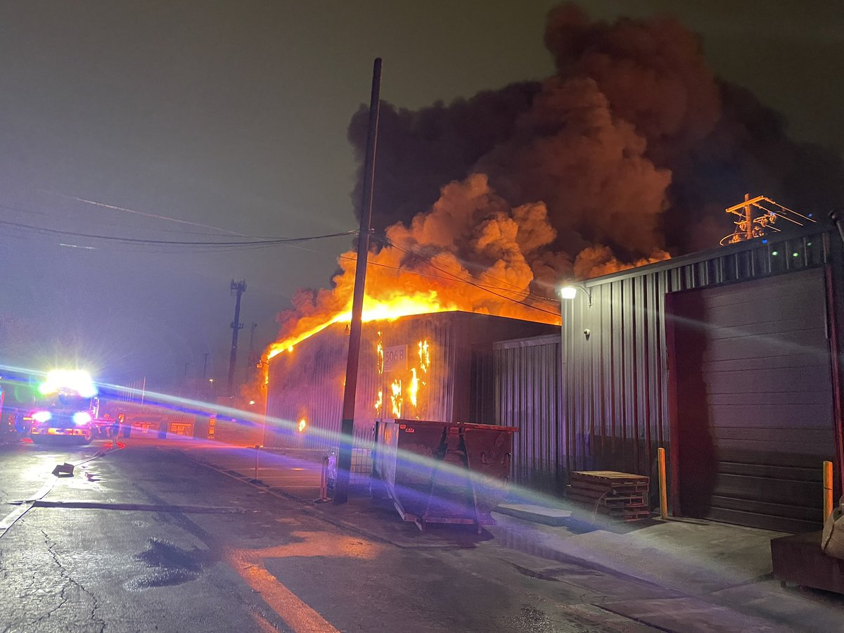 Structure Fire 400 blk E St Elmo.  Now a second alarm for a 200K sq ft warehouse with fire through the roof on arrival