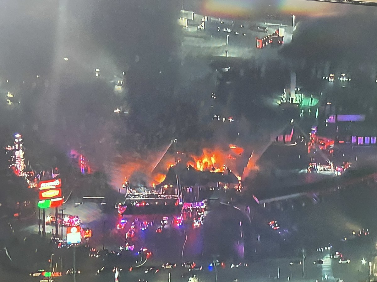 Fire crews are battling a massive blaze at a Flying J travel center  in San Antonio