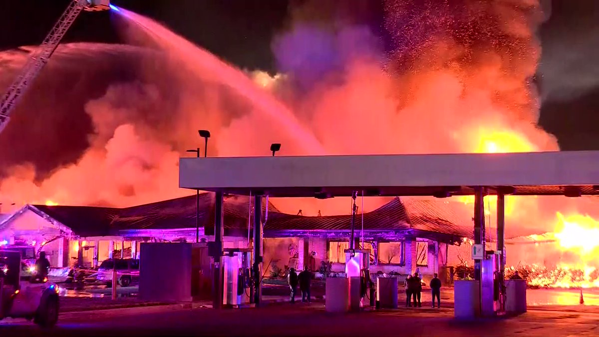 Images of a massive blaze at Flying J gas station near I-10 in San Antonio. It began as a fire at the Denny's restaurant. It's a total loss.   At least one firetruck has been damaged. 50-60 semis were at the stop when the fire broke out. Smoke was visible miles away