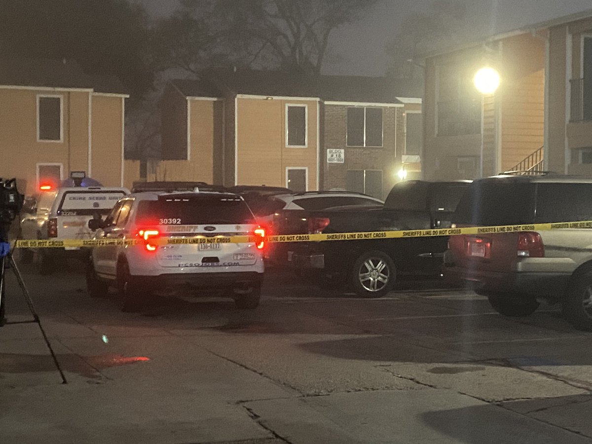 Sheriff's office say a man, in bed, was killed by a stray bullet at an apartment complex on Aldine Mail Route in North Harris County