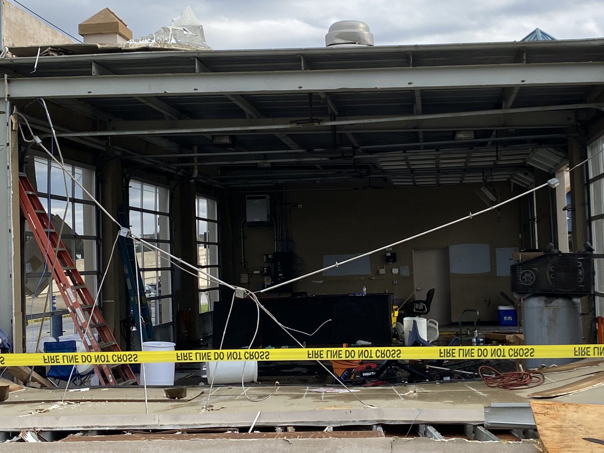 Damage at the Mustang Elite Carwash in Grapevine. Across the street from here are the Superwalmart and Sam's Club blocked off by police