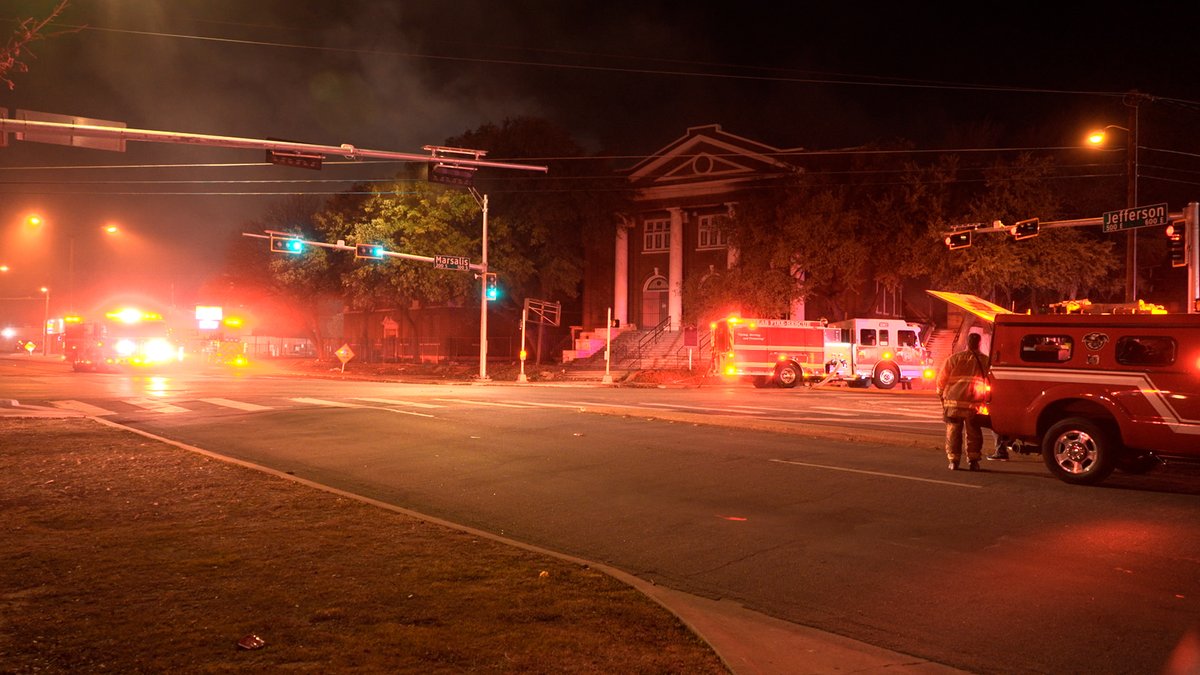 Responded to a report of heavy smoke at a large abandoned church at the corner of Marsalis and Jefferson some streets are blocked,