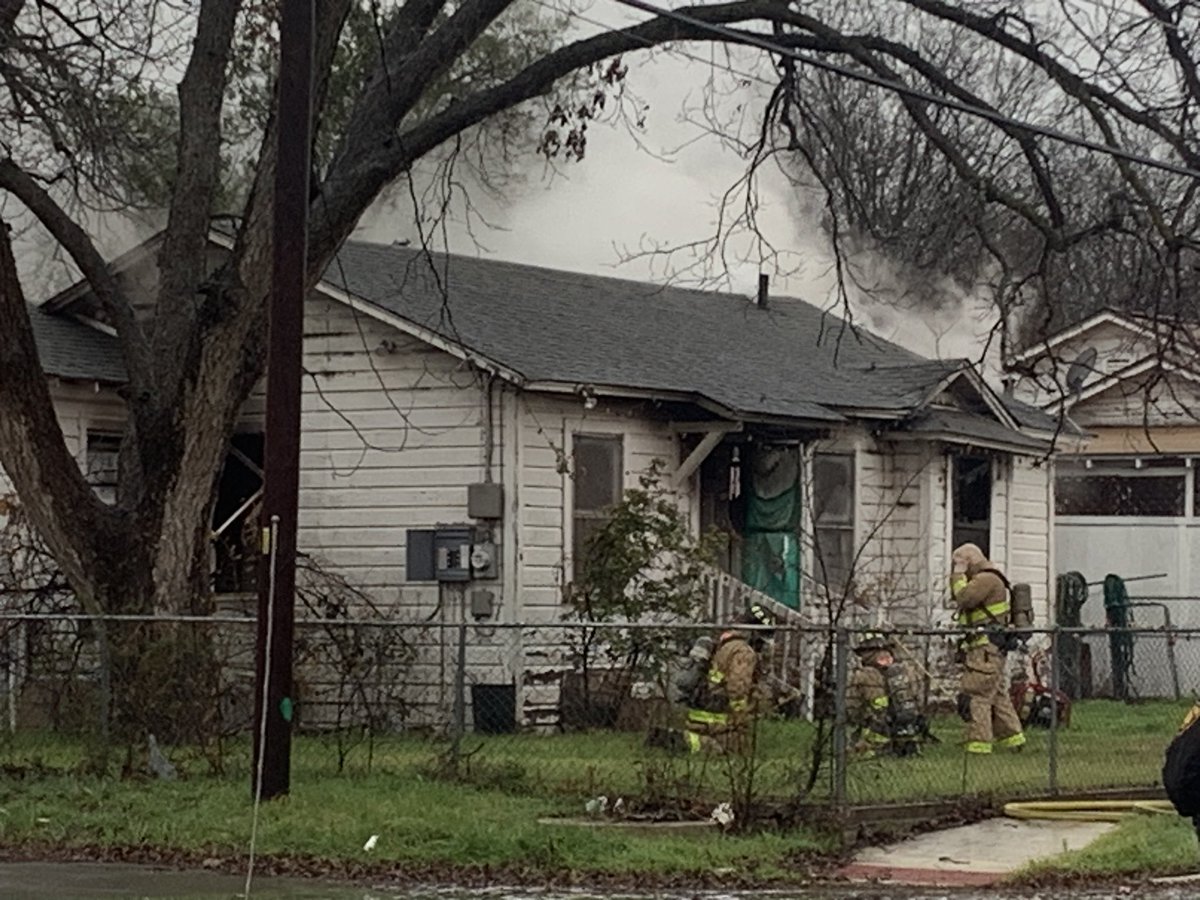 A fire breaks out at 215 E Dickson. Fire officials say San Antonio police  officers pulled out a woman from a burning home. The woman was then transported to Samc with what is believed to be some burns. Fire is being investigated