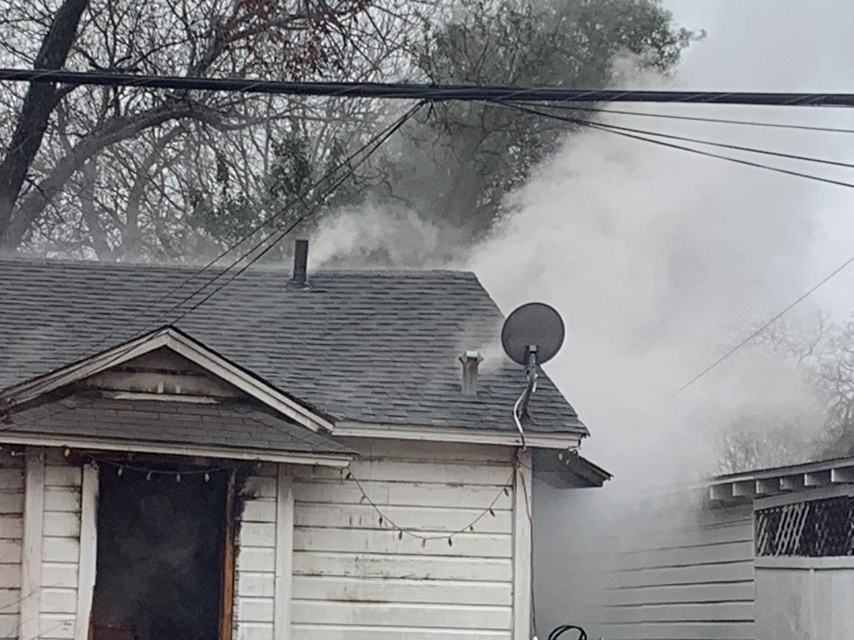 A fire breaks out at 215 E Dickson. Fire officials say San Antonio police  officers pulled out a woman from a burning home. The woman was then transported to Samc with what is believed to be some burns. Fire is being investigated