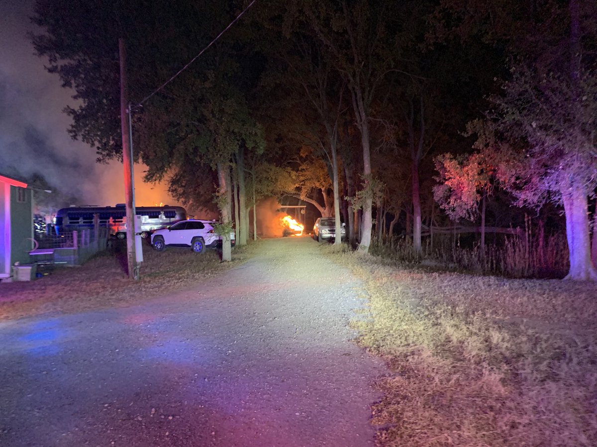 AFD and ⁦@TC_Fire_Rescue⁩ units onscene in the 700 blk of Dalton Ln with a fully involved structure fire that has spread to grass and vehicle. Fire has been contained