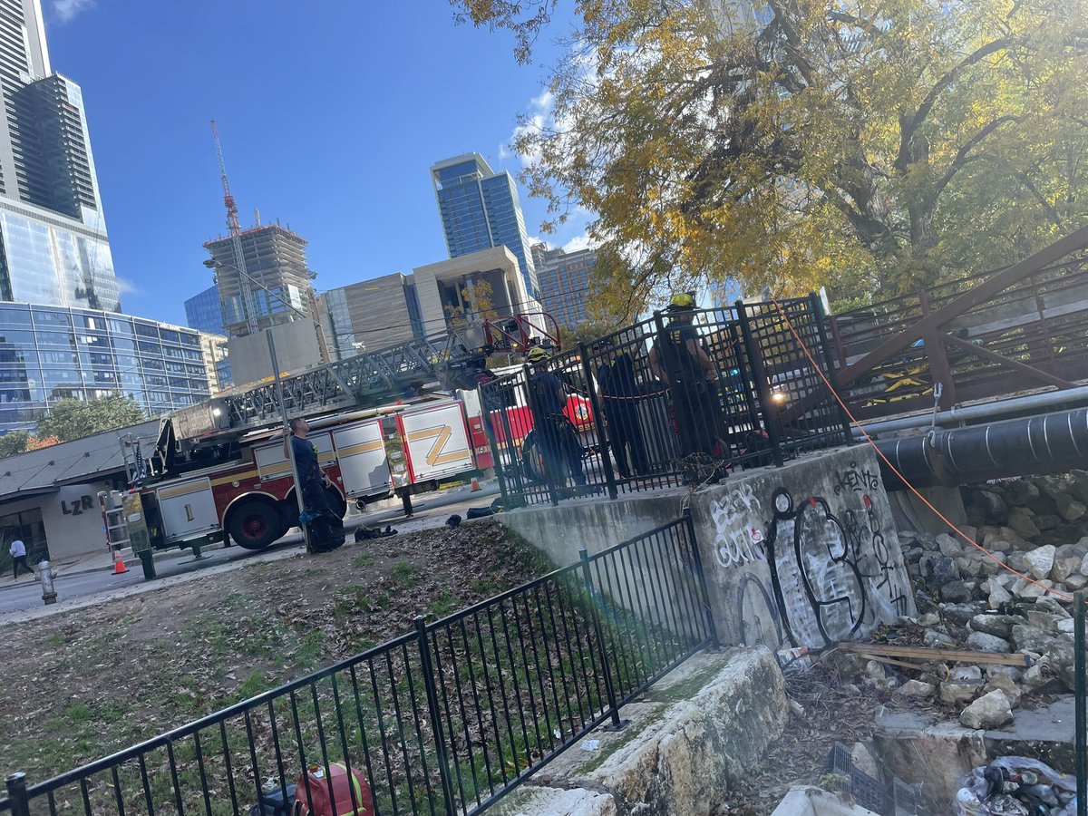 Austin Fire and our partners at ATCEMS currently rescuing an injured person from under the pedestrian bridge at 4th and Rio Grande.
