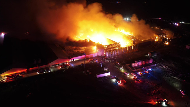 A massive fire engulfed a chicken farm in Texas on Monday, with firefighters still at the scene today