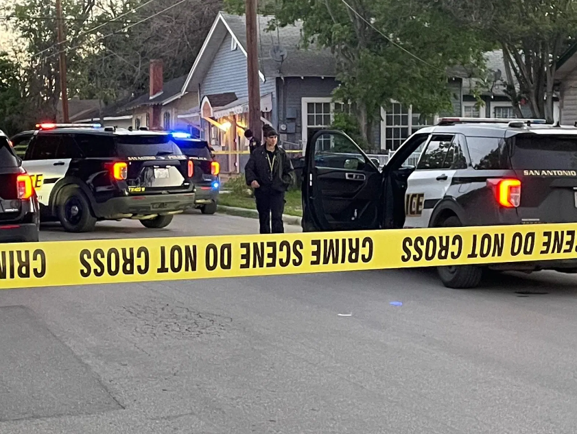 A 13-year-old boy is in critical condition after being shot in the back while he was in his living room during a drive-by shooting