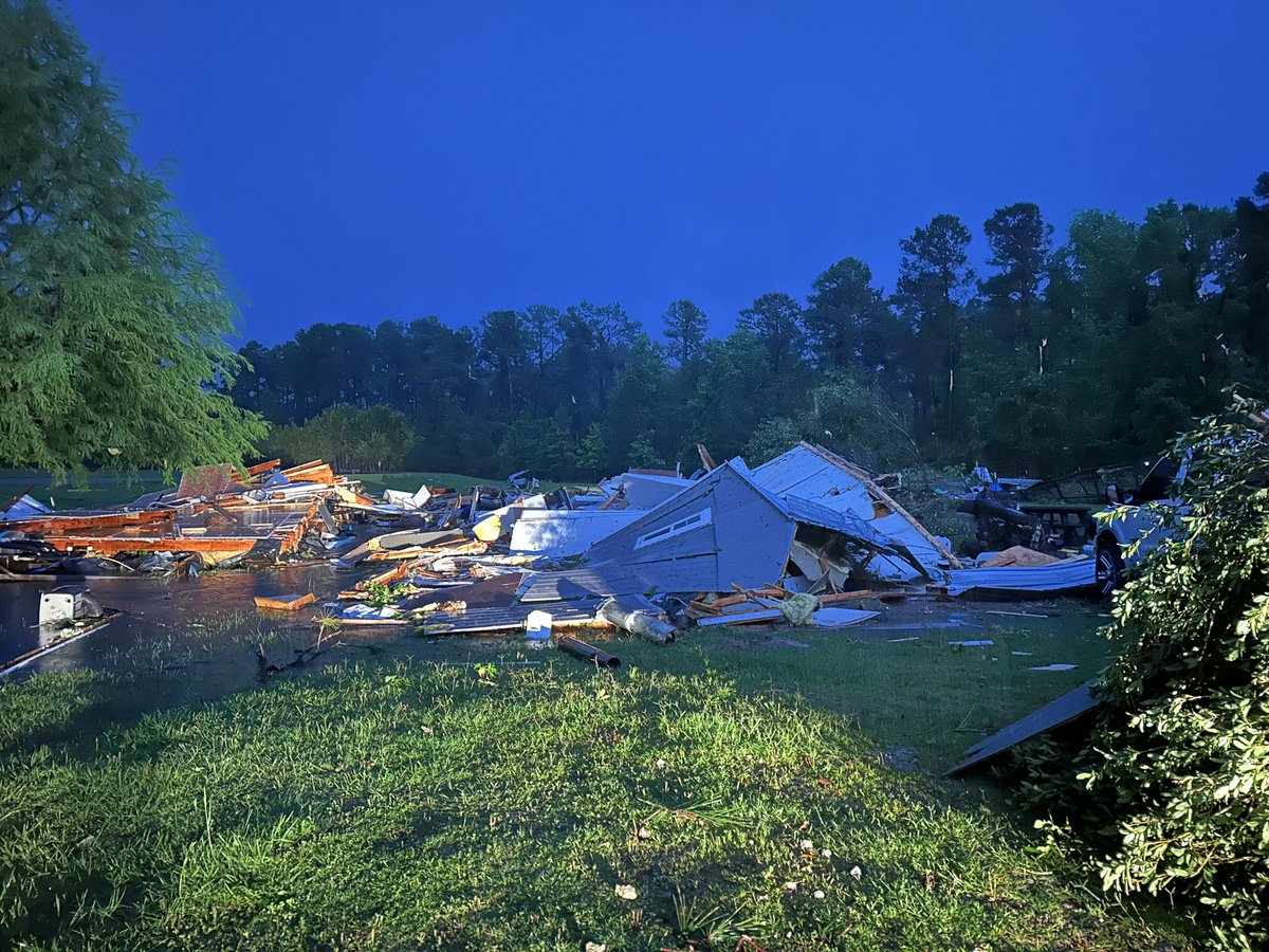 At least one home in Trinity is destroyed after severe storms moved through the area Sunday night. Vehicles are overturned. Other nearby homes damaged