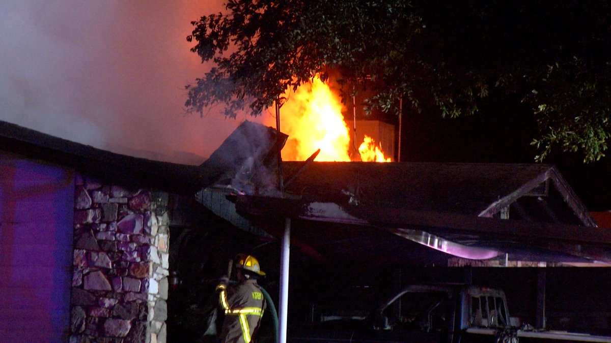 Two people and a cat made it out safe after an early morning house fire in Northeast Side Bexar County