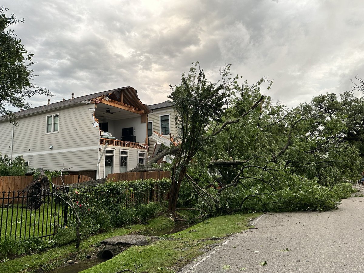 Near downtown Houston, TX.  Roofs and walls blown off buildings, trees down as well.  This is in the Heights area.