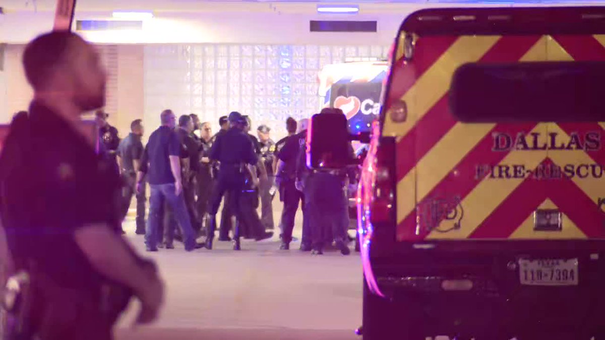 Dozens of police officers are waiting outside Methodist Hospital, where an officer who was seriously injured was taken. The other 2 injured officers were taken to Baylor