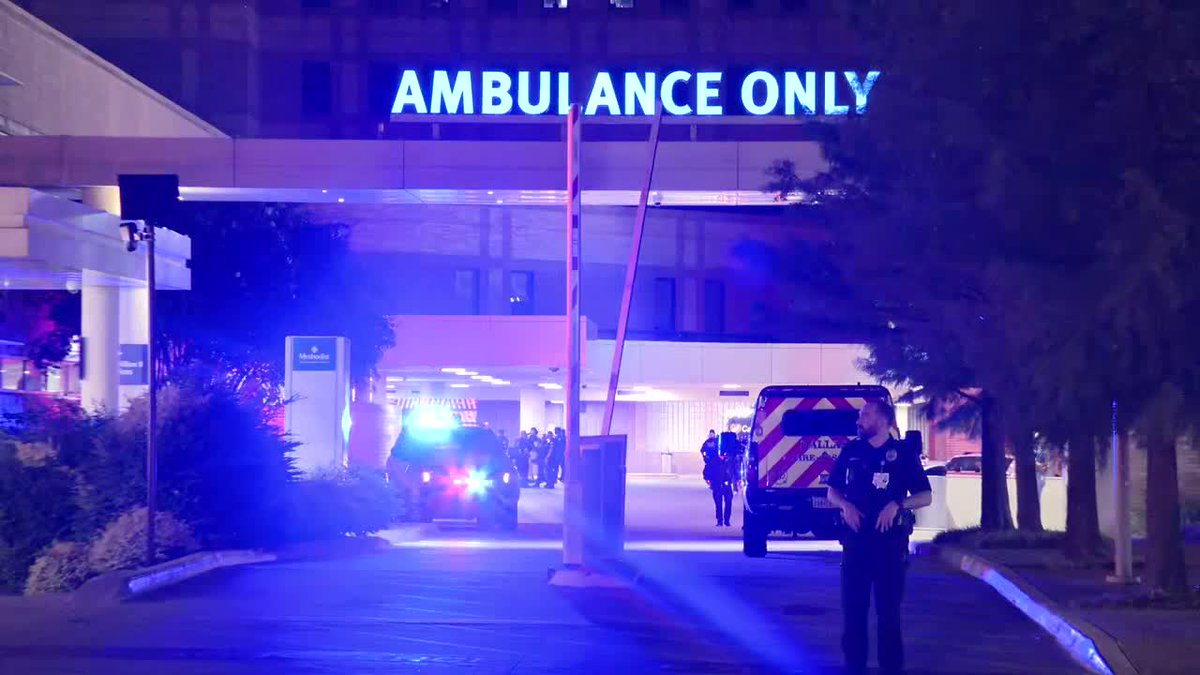 Dozens of police officers are waiting outside Methodist Hospital, where an officer who was seriously injured was taken. The other 2 injured officers were taken to Baylor