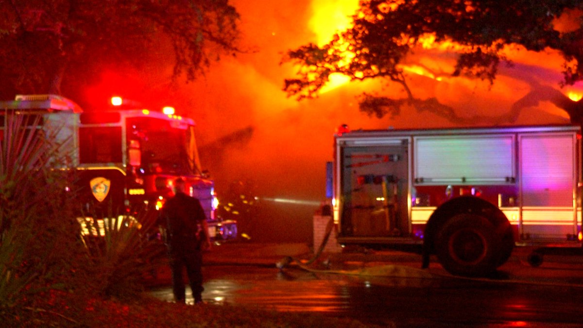 A firefighter was hospitalized after battling a massive house fire on the North Side off Whisper Path Street near Lockhill Selma Road.