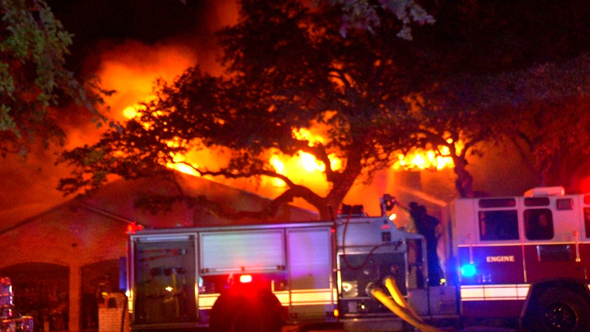 A firefighter was hospitalized after battling a massive house fire on the North Side off Whisper Path Street near Lockhill Selma Road.