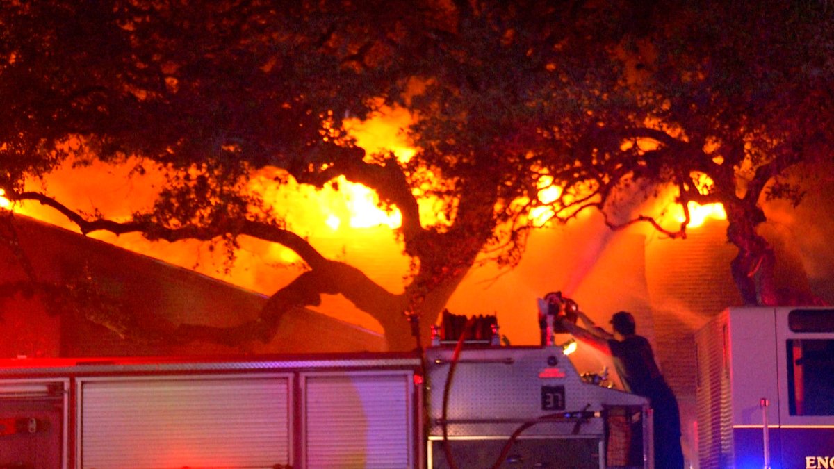 A firefighter was hospitalized after battling a massive house fire on the North Side off Whisper Path Street near Lockhill Selma Road.