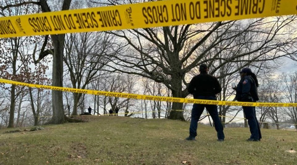 Police are investigating after an officer discovered a corpse in an abandoned golf cart left in the woods