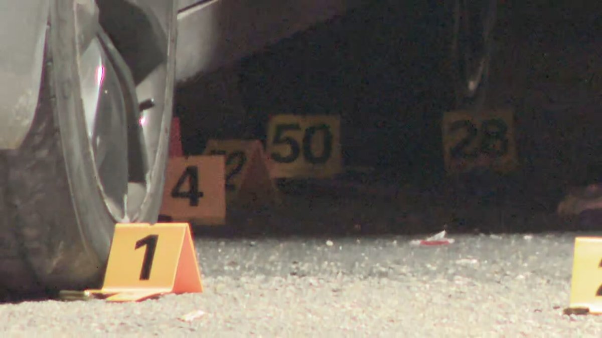 Fatal shooting   suspects are at large, and one person is dead after his car was riddled with a large amount of gunfire.