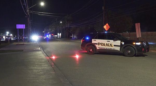 A woman was fatally struck by a vehicle while attempting to cross the street in a hit and run accident on the Northeast Side