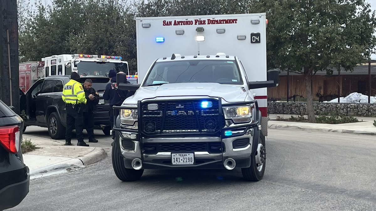 Woman runs out of her apartment and second person runs after. Police tell that the woman tried to drive off and the second person hung on to the mirror. The person was run over their arm by the front tire. Police investigating.Victim transported