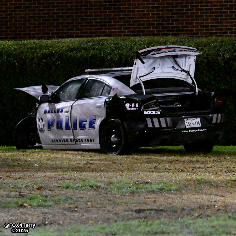 A Dallas Police officer is in the hospital this morning after an alleged impaired driver ran a red light and crashed into his squad car.