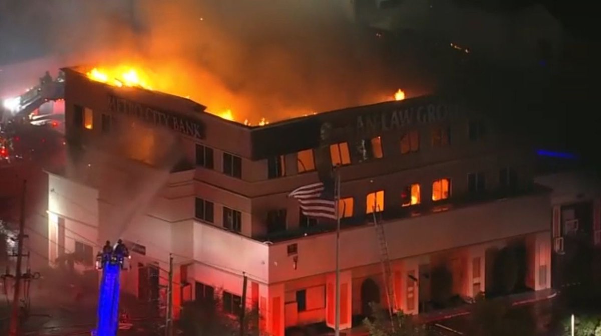 100 firefighters battled a three-alarm fire at a Southwest Side Houston building