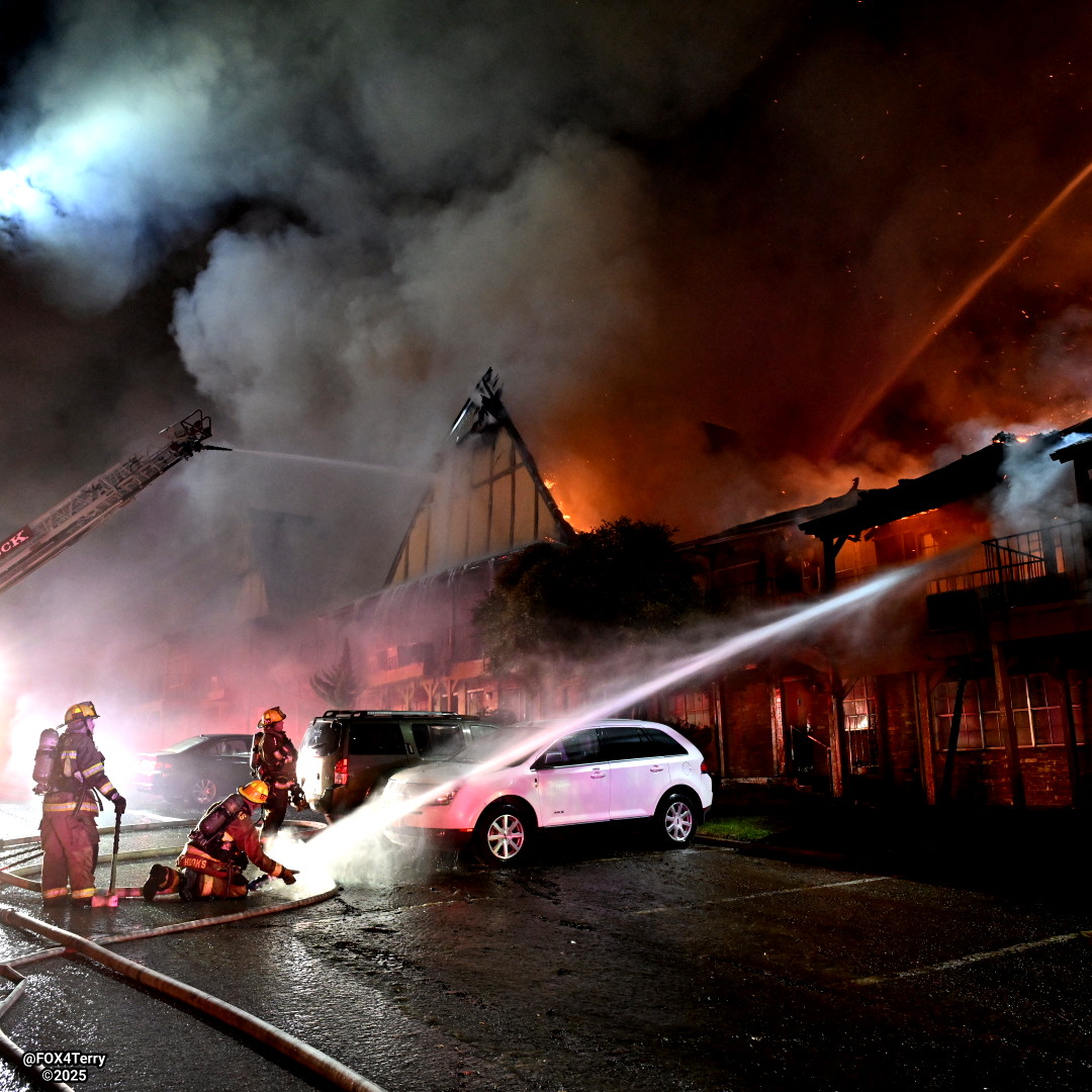 Dallas firefighters battle an overnight apartment fire.