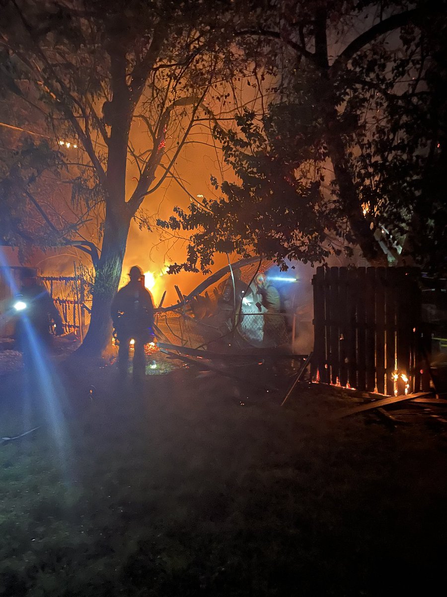 Austin firefighters on scene of a detached garage fully enveloped in flames in the 3000 block of E 16th Street. 