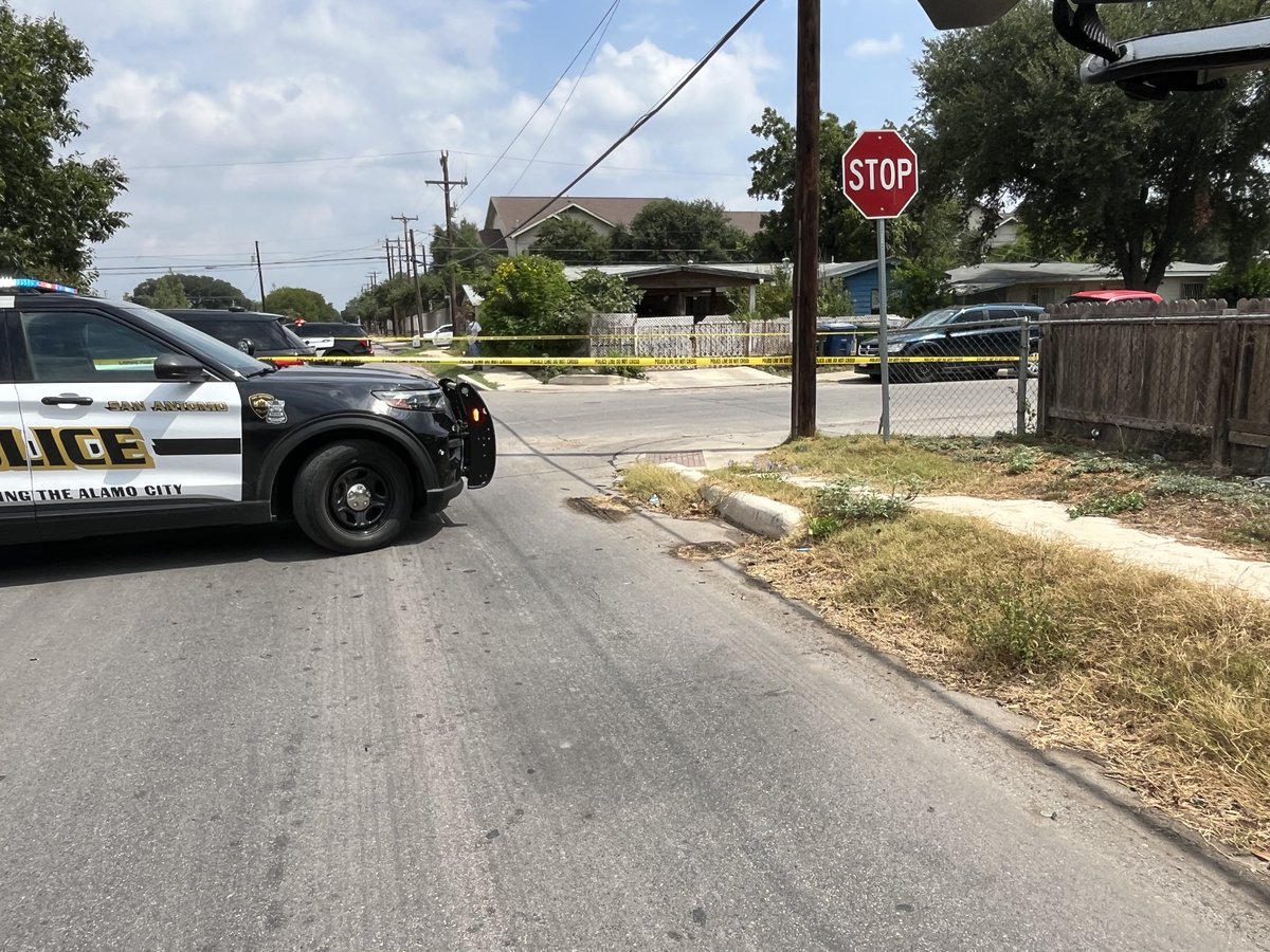 A mailman discovered the body of a dead man, which police are investigating connection to nearby drive-by that occurred earlier this morning