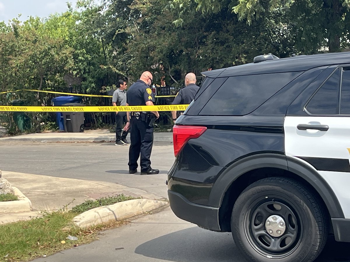 A mailman discovered the body of a dead man, which police are investigating connection to nearby drive-by that occurred earlier this morning