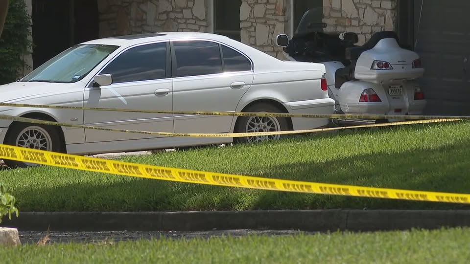 Father breaks down door, finds 9-year-old son stabbed; mother clutches knife, report says
