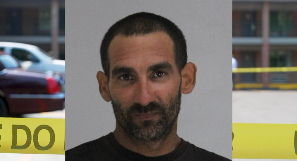 A person was beheaded at a Dallas motel on Wednesday morning, and a suspect is in custody.