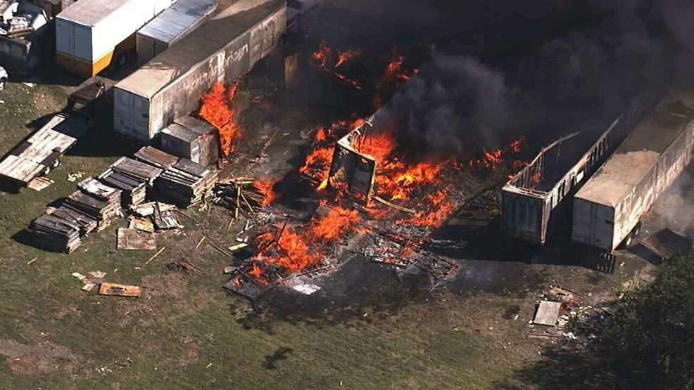 Nearly 100 firefighters contain massive blaze at Apple Moving Co. despite gusty winds