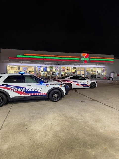 Constables investigating a robbery of a business near 11500 Bammel N Houston Rd