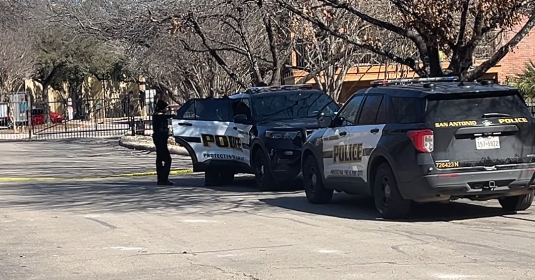 A suspect was taken into custody after allegedly stabbing a woman multiple times on the Northeast Side