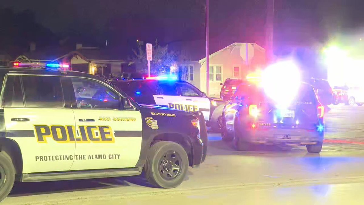 people were hospitalized after police say a drive-by shooting at an East Side intersection caused them to crash