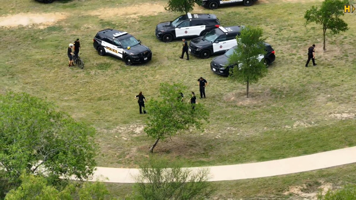 Police are on the scene after two bicyclists noticed fire and smoke and discovered a body on fire along the Leon Creek Greenway. The San Antonio Police Department confirmed that the body was a woman, and evidence of an accelerant was found