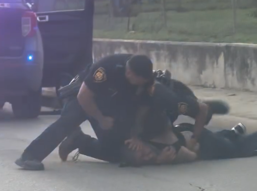 A viewer-shared video from the East Side shows what appears to be an arrest involving San Antonio Police Department officers, including an officer punching a man while he is already on the ground.