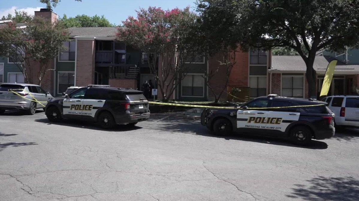Two men were hospitalized after police say a fight between roommates turned violent on the city's Northwest Side.