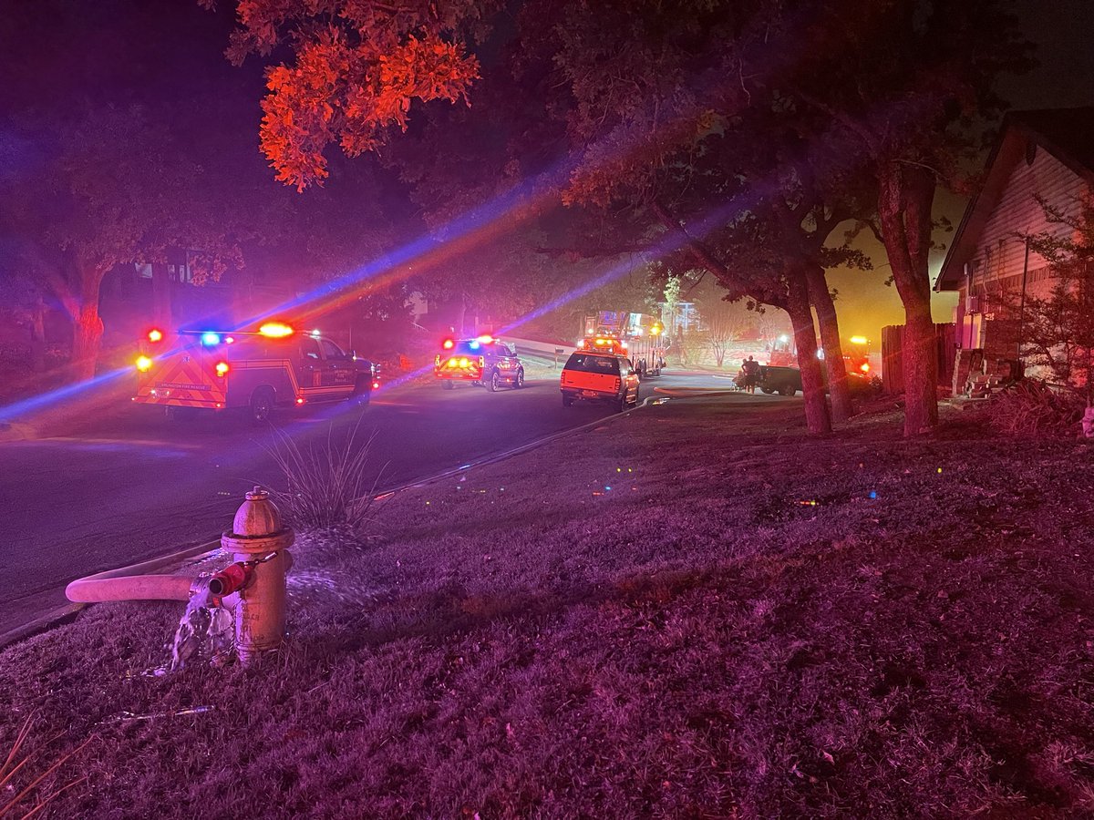 House Fire (Arlington) Arlington FD is working a house fire on Woodside Court. Engine 14 first on scene with fire showing from a two story house, working fire