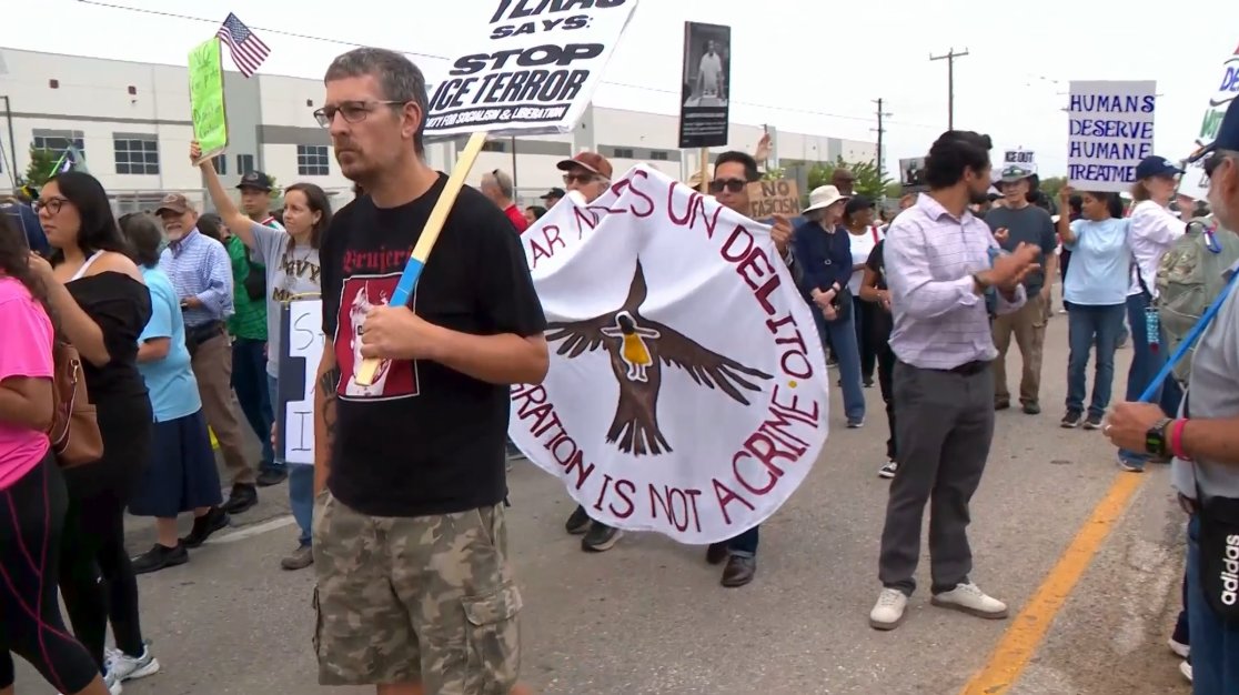 Protesters took to the streets of San Antonio's East Side on Saturday morning, marching against plans to convert a massive warehouse into a federal immigration detention facility that could house approximately 1,500 people
