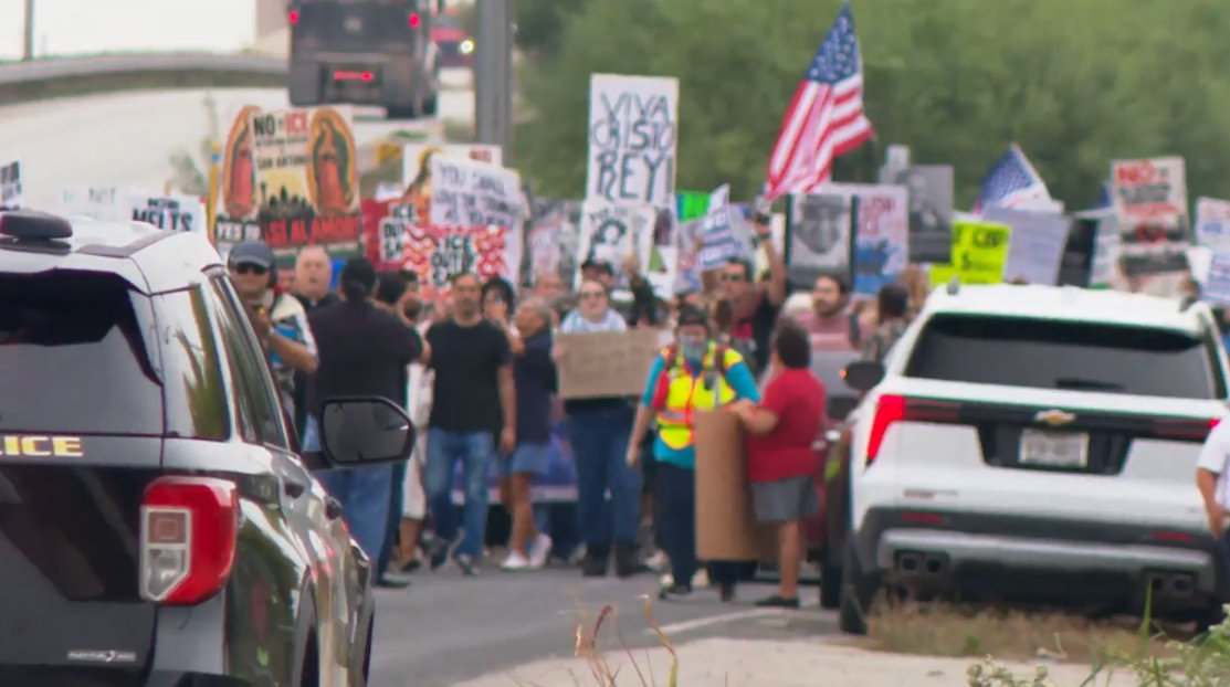 Protesters took to the streets of San Antonio's East Side on Saturday morning, marching against plans to convert a massive warehouse into a federal immigration detention facility that could house approximately 1,500 people
